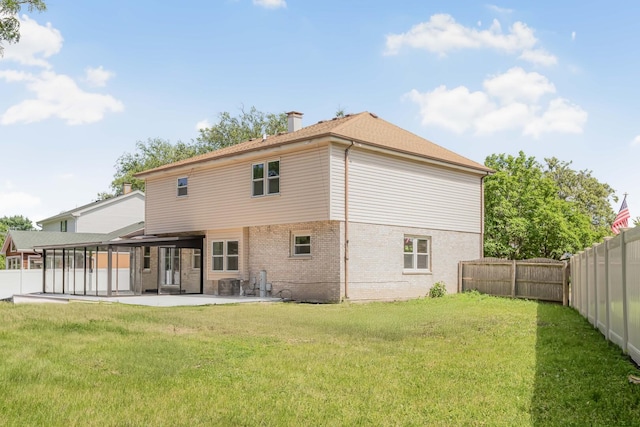 716 Somerset Ln, Darien, IL 60561 - rear view of house featuring a patio, a fenced backyard, brick siding, and a chimney