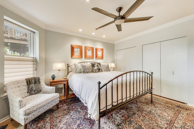 917 W Gunnison St Unit 1W, Chicago, IL 60640 - bedroom with two closets, crown molding, recessed lighting, and a ceiling fan