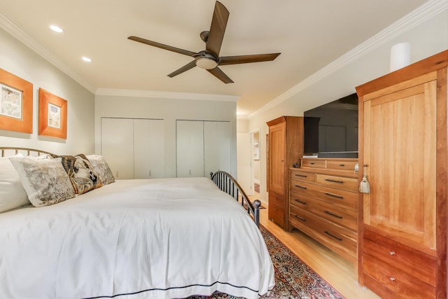 917 W Gunnison St Unit 1W, Chicago, IL 60640 - bedroom with light wood-type flooring, multiple closets, crown molding, recessed lighting, and ceiling fan