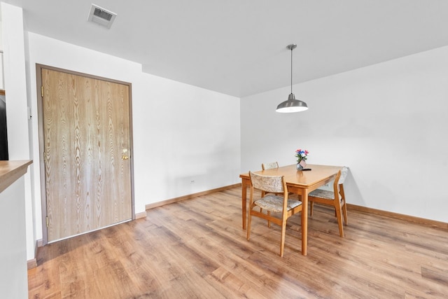 671 Hapsfield Ln Unit 105, Buffalo Grove, IL 60089 - dining space with wood finished floors and baseboards