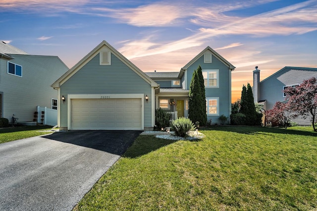 39371 Crofton Ln, Beach Park, IL 60083 - traditional-style home featuring driveway, an attached garage, and a yard
