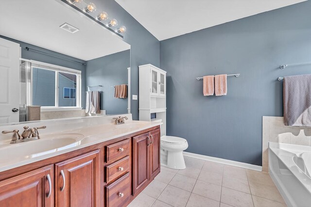 39371 Crofton Ln, Beach Park, IL 60083 - bathroom with a bath, double vanity, and tile patterned flooring