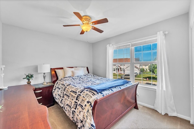 39371 Crofton Ln, Beach Park, IL 60083 - bedroom with light carpet and ceiling fan