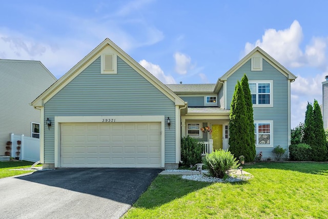 39371 Crofton Ln, Beach Park, IL 60083 - view of front of home featuring driveway, a front yard, and an attached garage