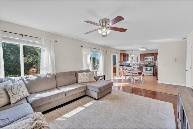 39371 Crofton Ln, Beach Park, IL 60083 - living room with a ceiling fan and light wood-type flooring