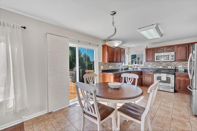 39371 Crofton Ln, Beach Park, IL 60083 - dining area with light tile patterned floors