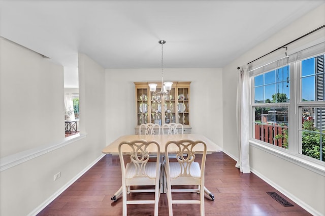 39371 Crofton Ln, Beach Park, IL 60083 - dining space with healthy amount of natural light, wood finished floors, and a chandelier
