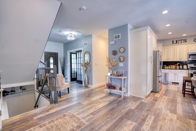 281 Fox Chase Dr N, Oswego, IL 60543 - foyer featuring light wood finished floors and recessed lighting
