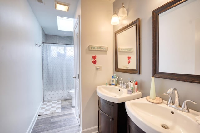 281 Fox Chase Dr N, Oswego, IL 60543 - bathroom featuring curtained shower and two vanities