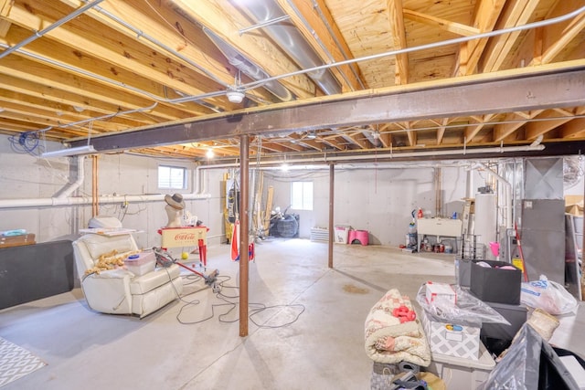 281 Fox Chase Dr N, Oswego, IL 60543 - basement with gas water heater and a sink