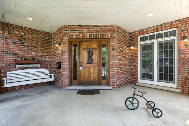 4829 Linscott Ave, Downers Grove, IL 60515 - doorway to property featuring brick siding and a porch