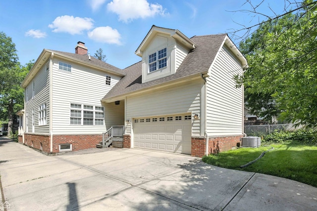 4829 Linscott Ave, Downers Grove, IL 60515 - view of front facade with concrete driveway, a garage, roof with shingles, and a chimney