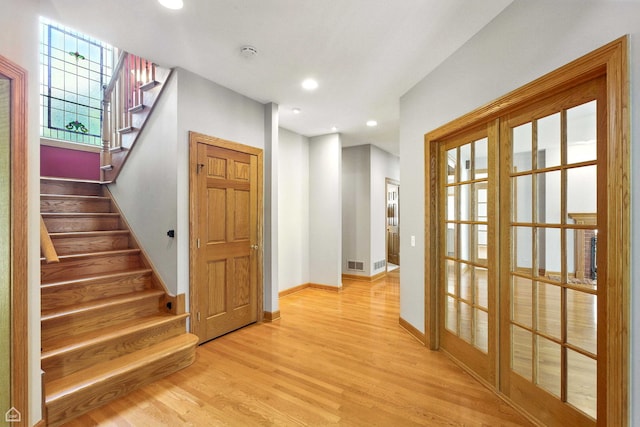 4829 Linscott Ave, Downers Grove, IL 60515 - entryway featuring wood finished floors, stairs, and recessed lighting