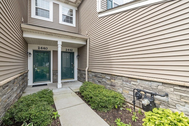 2442 Oneida Ln, Naperville, IL 60563 - property entrance featuring stone siding and a porch