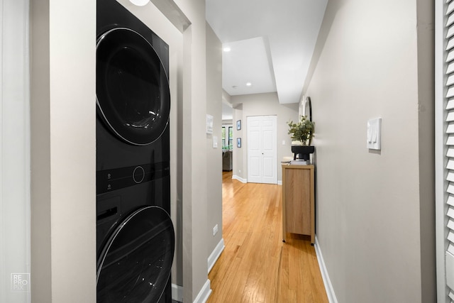 2636 N Fairfield Ave Unit 2N, Chicago, IL 60647 - washroom with stacked washer / dryer, light wood-type flooring, and recessed lighting