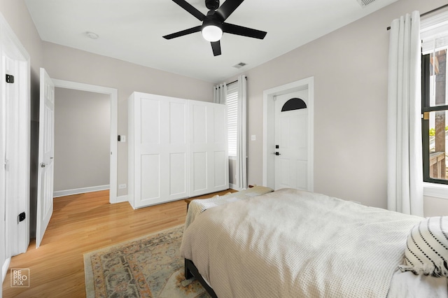 2636 N Fairfield Ave Unit 2N, Chicago, IL 60647 - bedroom with light wood-style floors and a ceiling fan