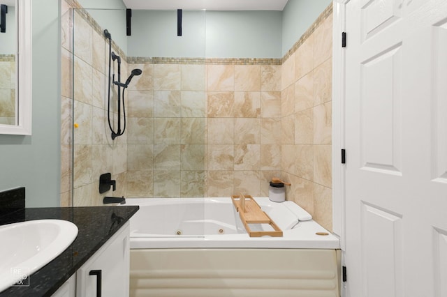 2636 N Fairfield Ave Unit 2N, Chicago, IL 60647 - bathroom featuring vanity, a combined bath / shower with jetted tub, and tile walls