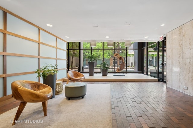 5445 N Sheridan Rd Unit 1515, Chicago, IL 60640 - common area with floor to ceiling windows and recessed lighting