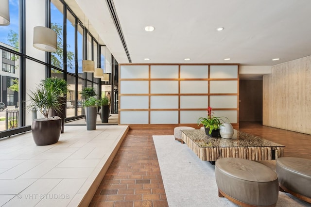 5445 N Sheridan Rd Unit 1515, Chicago, IL 60640 - community lobby with expansive windows and recessed lighting
