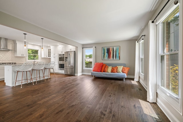 413 Northampton Ct, Naperville, IL 60565 - living area featuring dark wood-type flooring and baseboards