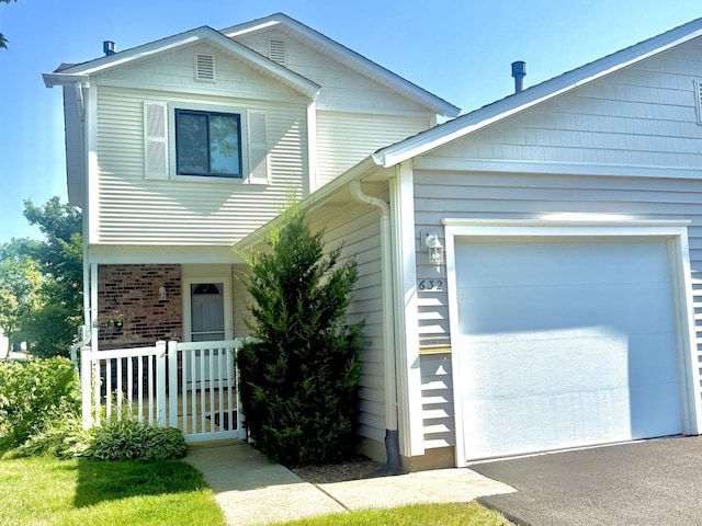 632 Bridgeview Pt, Schaumburg, IL 60194 - view of front of home with a garage