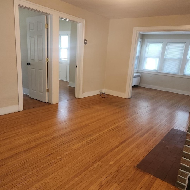 1223 Putnam St, Peru, IL 61354 - spare room with light wood-type flooring and baseboards