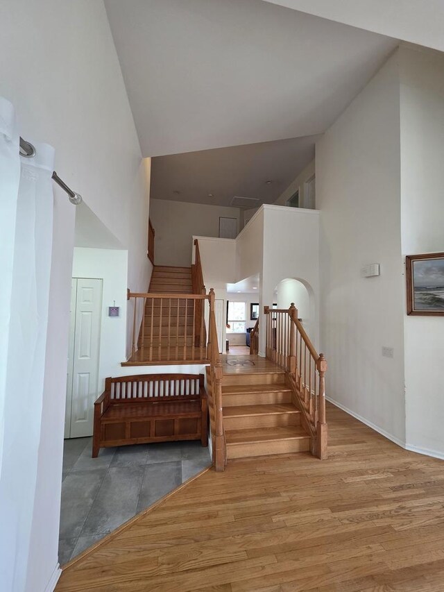 7943 Dada Dr, Gurnee, IL 60031 - stairway with a high ceiling and wood finished floors