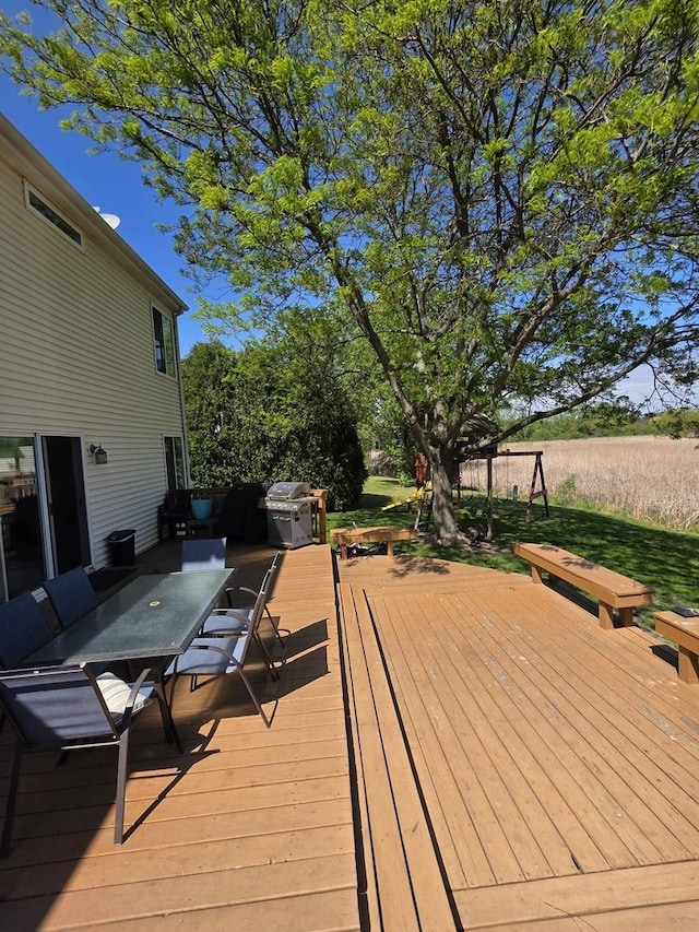 7943 Dada Dr, Gurnee, IL 60031 - wooden deck featuring outdoor dining area