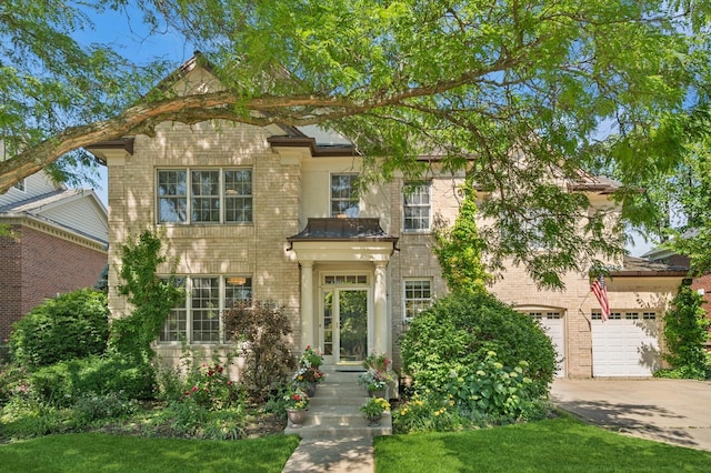 1318 Bennington Ct, Glenview, IL 60026 - view of front of property with driveway, brick siding, a garage, and a front lawn