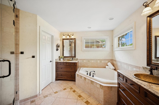 1318 Bennington Ct, Glenview, IL 60026 - bathroom featuring tile patterned flooring, two vanities, a garden tub, a stall shower, and inlaid floor details