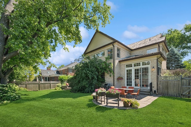 1318 Bennington Ct, Glenview, IL 60026 - rear view of property with brick siding, a patio area, a fenced backyard, and french doors