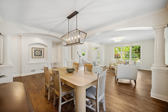 1318 Bennington Ct, Glenview, IL 60026 - dining room featuring ornate columns, dark wood finished floors, stairway, ornamental molding, and arched walkways