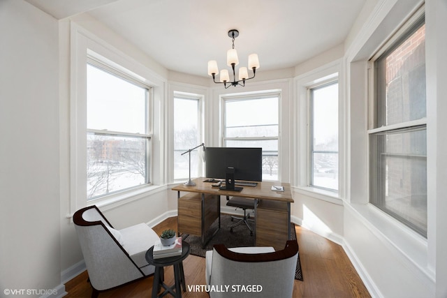 745 S Independence Blvd Unit 3N, Chicago, IL 60624 - office featuring wood finished floors, a chandelier, and plenty of natural light