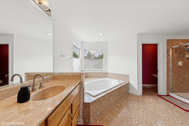 2397 Pebble Beach Ln, Riverwoods, IL 60015 - bathroom featuring vanity, a jetted tub, and a shower stall