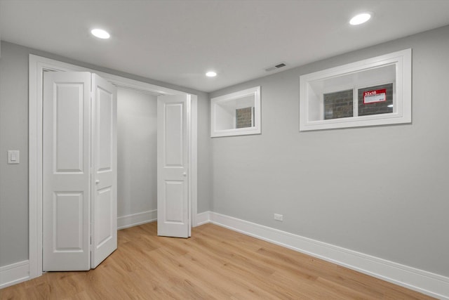 1521 N Maplewood Ave, Chicago, IL 60622 - unfurnished bedroom featuring light wood-type flooring, recessed lighting, and a closet