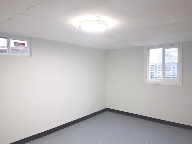 below grade area featuring baseboards