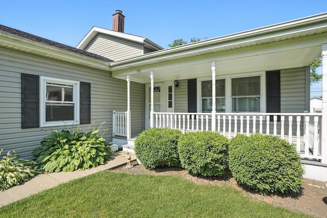 510 Dunbar St, Beecher, IL 60401 - view of front of home featuring a porch and a chimney