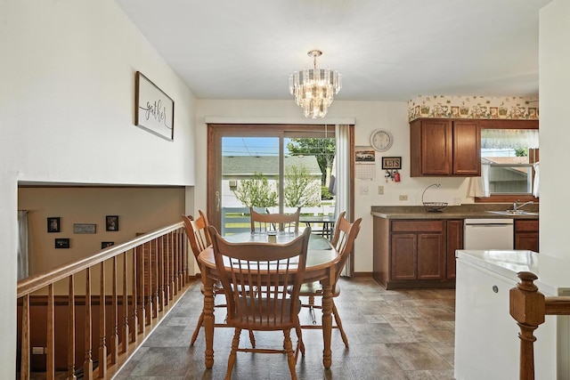 510 Dunbar St, Beecher, IL 60401 - dining room featuring stone finish flooring and a chandelier