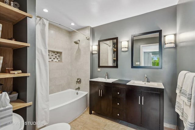 1700 Bolson Dr, Downers Grove, IL 60516 - full bath featuring shower / bath combo, wood finished floors, double vanity, and recessed lighting