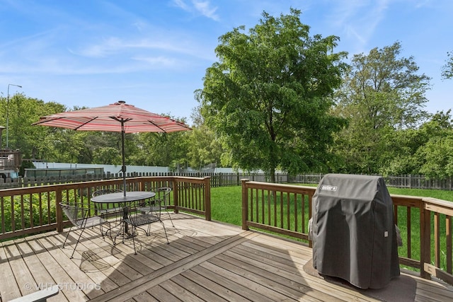 1700 Bolson Dr, Downers Grove, IL 60516 - deck featuring area for grilling, a fenced backyard, and outdoor dining space
