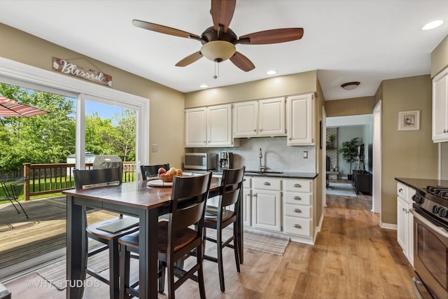 1700 Bolson Dr, Downers Grove, IL 60516 - dining room featuring ceiling fan, light wood-style flooring, and recessed lighting