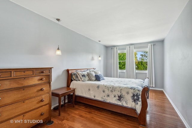 1700 Bolson Dr, Downers Grove, IL 60516 - bedroom with wood-type flooring and baseboards
