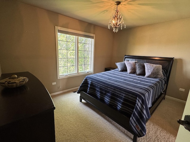 4213 Steam Mill Ct, Oswego, IL 60543 - carpeted bedroom with baseboards and a chandelier