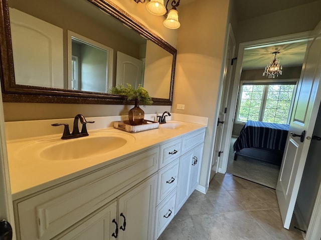 4213 Steam Mill Ct, Oswego, IL 60543 - full bath featuring double vanity, a chandelier, ensuite bath, and tile patterned flooring