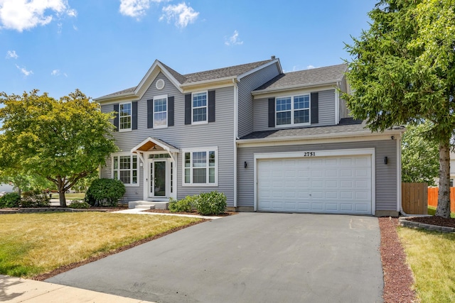 2751 Cedar Creek Cutoff Rd, Wauconda, IL 60084 - colonial house with concrete driveway and an attached garage