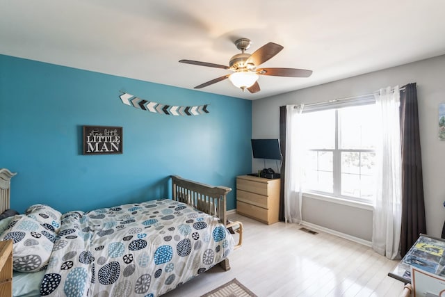15 Richmond Cir S, Elgin, IL 60177 - bedroom with wood finished floors and ceiling fan