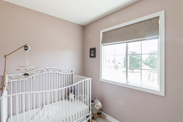 15 Richmond Cir S, Elgin, IL 60177 - bedroom with a crib and baseboards