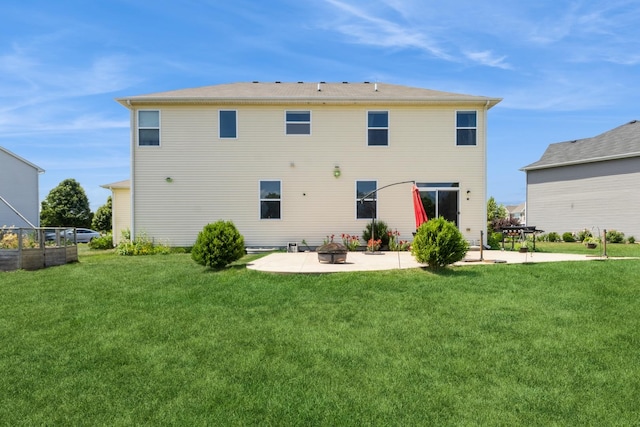 15 Richmond Cir S, Elgin, IL 60177 - rear view of house with a patio area and a lawn