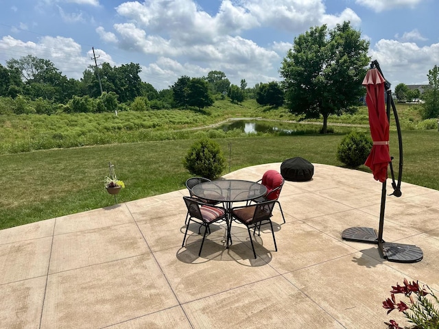 15 Richmond Cir S, Elgin, IL 60177 - view of patio / terrace with a water view and outdoor dining area