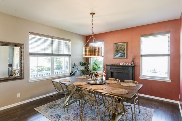 15 Richmond Cir S, Elgin, IL 60177 - dining room with dark wood-style floors and a fireplace